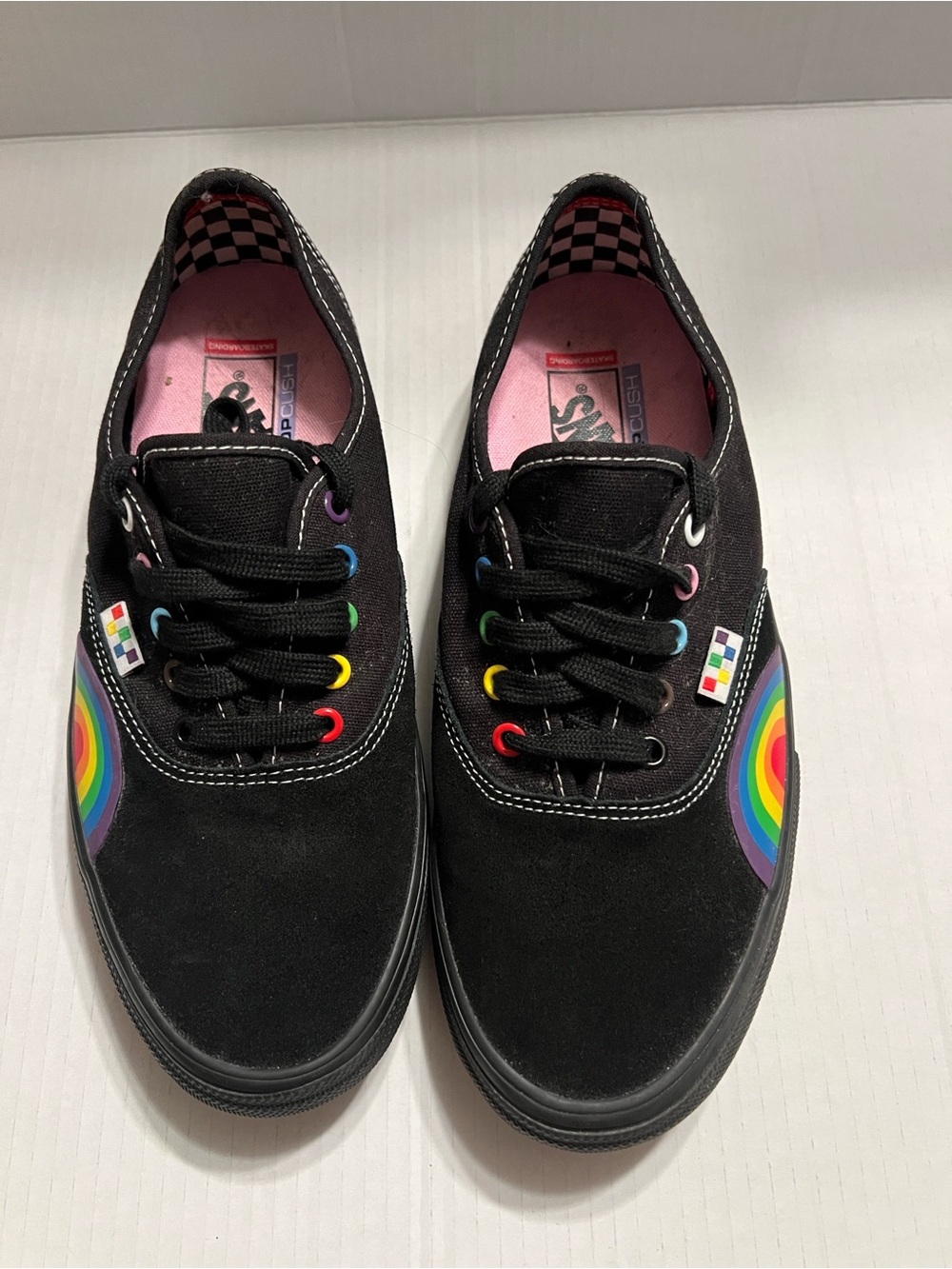 Vans black canvas skateboarding shoes with 🌈 rainbows